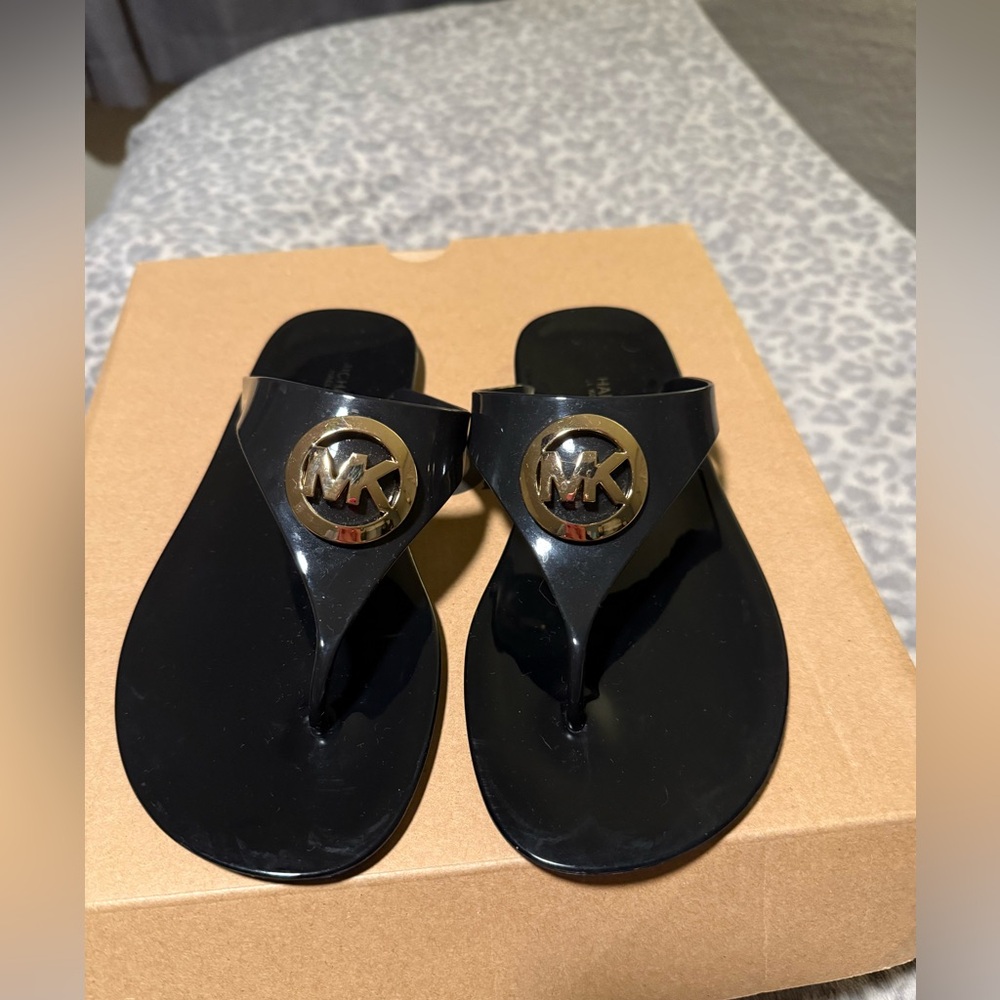 Michael Kors Black Flip Flops with Gold Emblem
